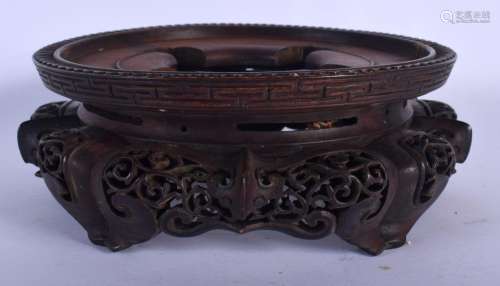 A 19TH CENTURY CHINESE HARDWOOD STAND Qing, with open work f...