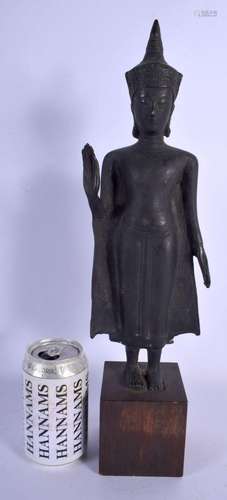 A 19TH CENTURY SOUTH EAST ASIAN BRONZE FIGURE OF A DEITY mod...