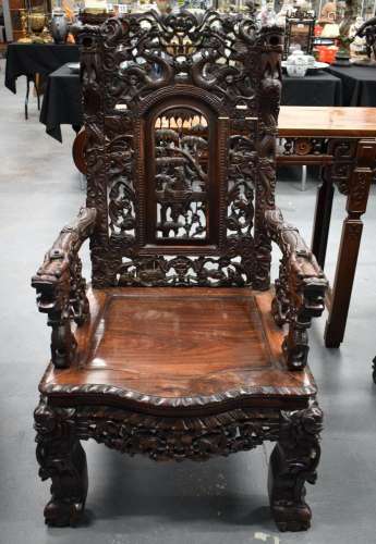 A LARGE MID 19TH CENTURY CHINESE HARDWOOD DRAGON THRONE CHAI...