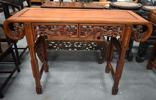A 19TH CENTURY CHINESE HARDWOOD ALTAR TABLE WITH BIRD FRIEZE...