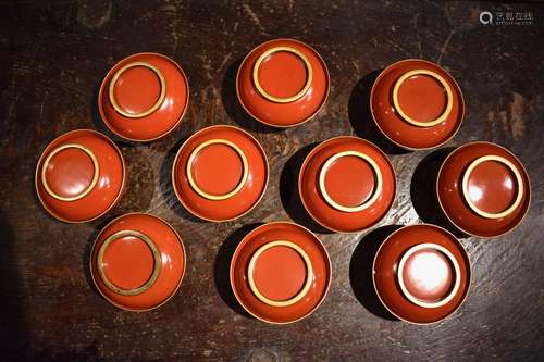 TEN: Set of ten red lacquered on wood soup bowl and cover