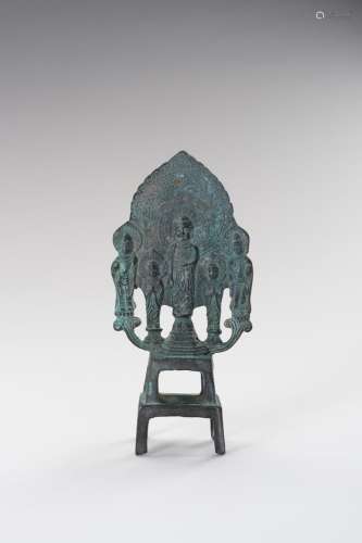 AN UNUSUAL TANG STYLE FOOTED BRONZE STELE