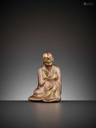 A GILT COPPER ALLOY FIGURE OF A LUOHAN, 17TH CENTURY