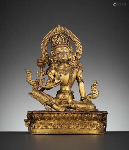 A GILT BRONZE FIGURE OF INDRA, 17TH CENTURY