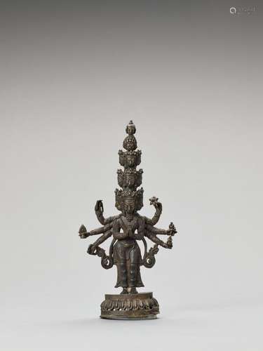 A SINO-TIBETAN BRONZE FIGURE OF EKADASHAMUKHA AVALOKITESVARA...