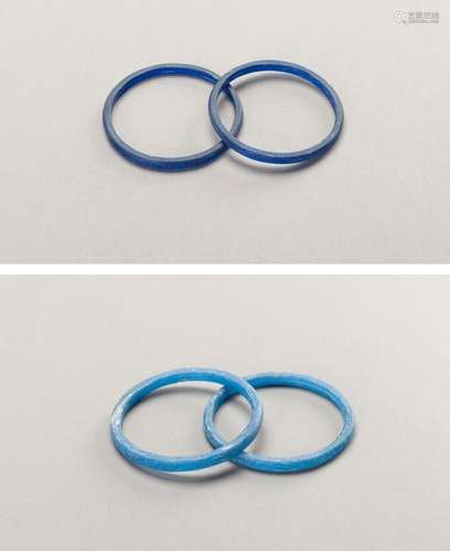 FOUR BLUE GLASS BANGLES