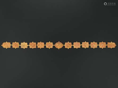 A 13-PART GOLD REPOUSSÉ BELT, TANG TO LIAO DYNASTY
