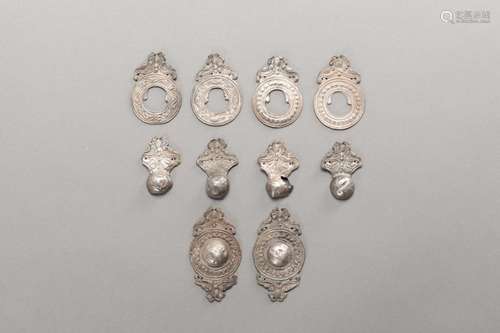 TEN SILVER ROBE ORNAMENTS