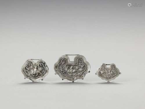 THREE SILVER LOCK CHARMS, LATE QING
