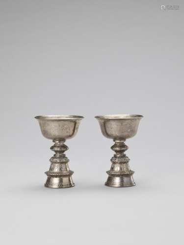 A PAIR OF SINO-TIBETAN BUTTER LAMPS, LATE 19TH CENTURY
