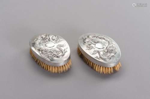 A PAIR OF TWO CHINESE EXPORT SILVER MOUNTED CLOTHES BRUSHES
