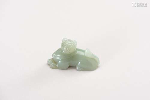 A CELADON JADE CARVING OF A DOMESTIC CAT