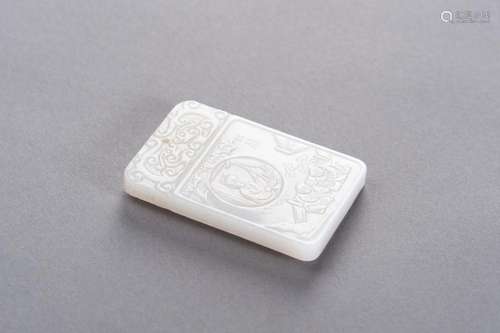 A WHITE JADE PLAQUE WITH GARDEN SCENE