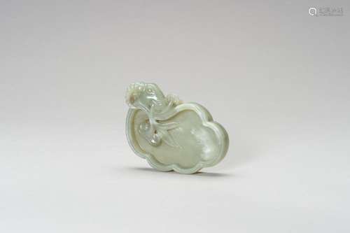 A CARVED CELADON JADE LINGZHI-FORM BRUSH WASHER WITH A RAM