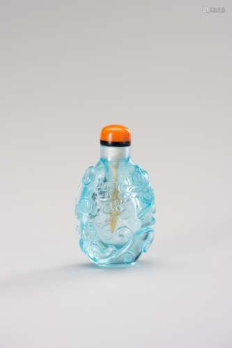 A TRANSPARENT ‘CHILONG’ AQUAMARINE GLASS SNUFF BOTTLE