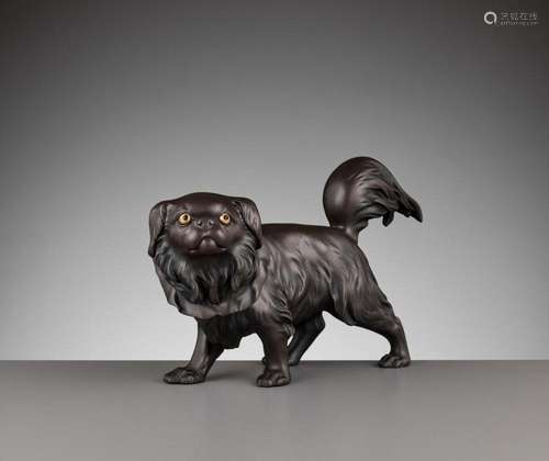 A RARE BRONZE OKIMONO OF A PEKINGESE DOG