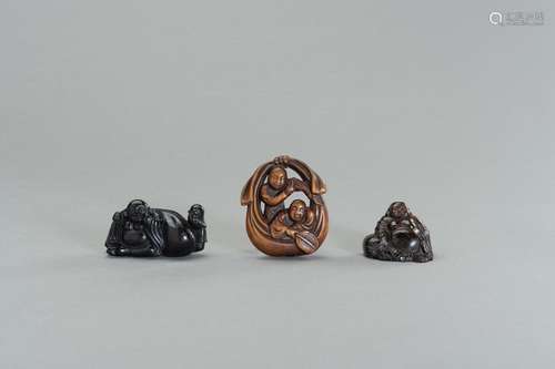 A GROUP OF THREE NETSUKE OF HOTEI AND KARAKO