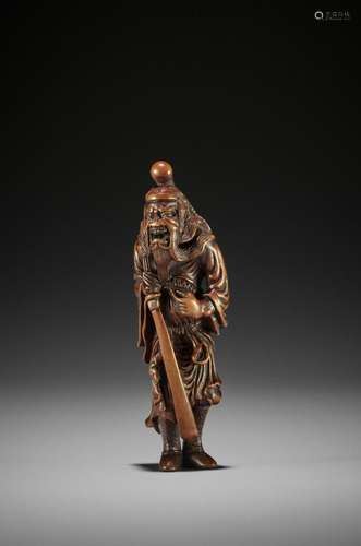 A SUPERB AND TALL WOOD NETSUKE OF SHOKI