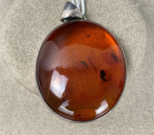 An Amber Color Pendent