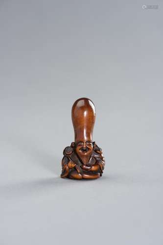 A WOOD NETSUKE OF FUKUROKUJU