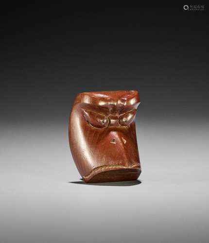 SUKENORI: A HIDA SCHOOL YEW WOOD MASK NETSUKE OF A KAPPA