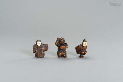 A GROUP OF THREE WOOD NETSUKE