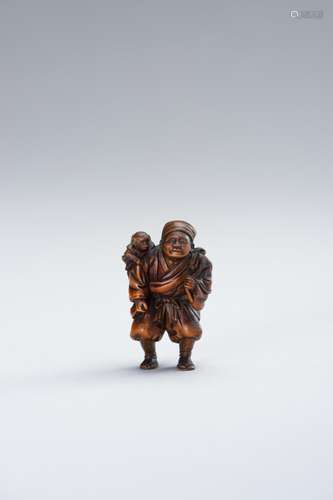 MINKOKU: A WOOD NETSUKE OF SARUMAWASHI