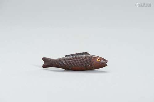 A LARGE WOOD FISH NETSUKE