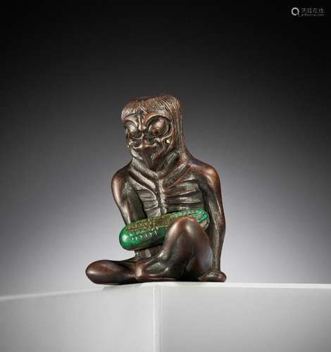 GYOKUSAI: A FINE INLAID WOOD NETSUKE OF A KAPPA WITH CUCUMBE...