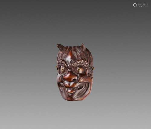 A VERY LARGE WOOD MASK NETSUKE OF AN ONI