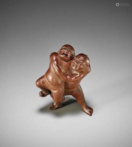 MASAKAZU: A WOOD NETSUKE OF TWO SUMO WRESTLERS