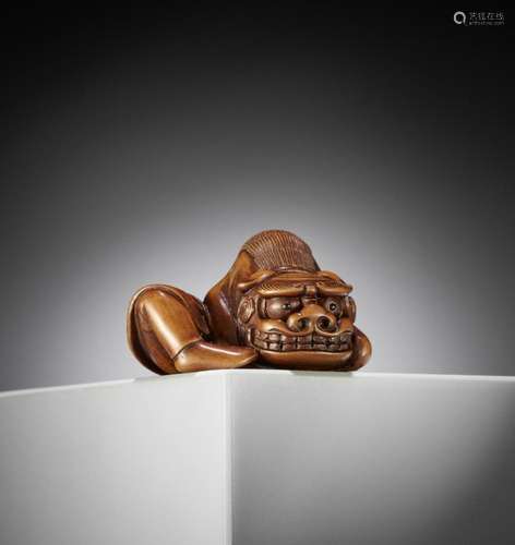 TOYOMASA: A SUPERB WOOD NETSUKE OF A SHISHIMAI DANCER