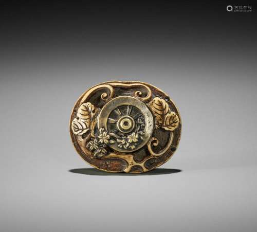 KOKUSAI: A RYUSA MANJU NETSUKE WITH A WATERWHEEL AND COINS