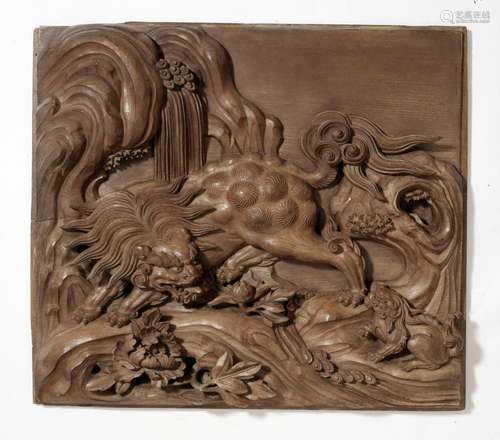 A MASSIVE AND FINELY CARVED WOOD PANEL WITH SHISHI AND CUB