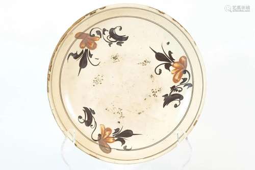 Sauce Black Colored Dish with Floral Design on a White