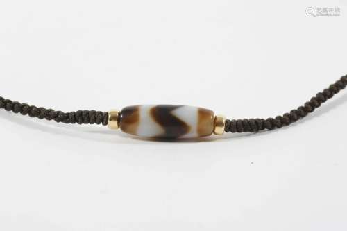 Dzi Bead with Tiger Tooth Pattern
