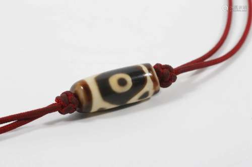 Dzi Bead with Two Eyes and Four Mountain-shaped Pattern