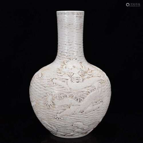 Qing Qianlong year white glaze carved dragon-print sky