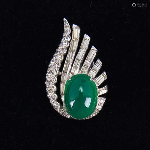 A JADEITE BROOCH