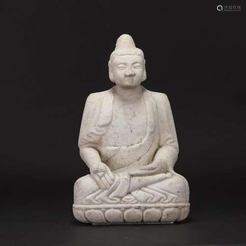 A WHITE STONE FIGURE OF BUDDHA