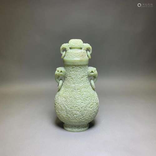 A CARVED CELADON WHITE JADE VASE AND COVER