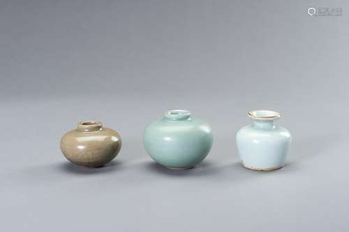 THREE SMALL CELADON GLAZED JARS