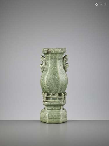 A CARVED LONGQUAN WALL VASE, MING