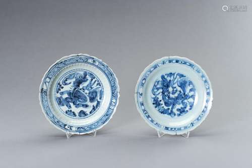 A PAIR OF MING DYNASTY ‘BUDDHIST LION’ DISHES, MUSEUM PROVEN...