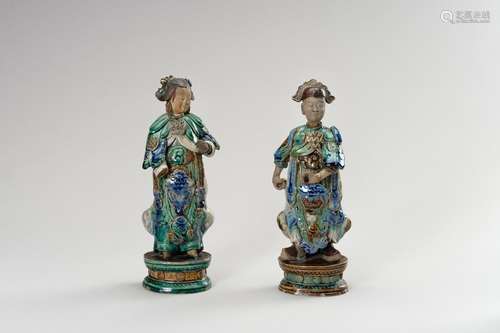 A PAIR OF GLAZED SHIWAN POTTERY FIGURES