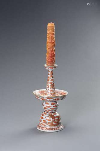 AN IRON-RED AND GILT-DECORATED PORCELAIN CANDLESTICK