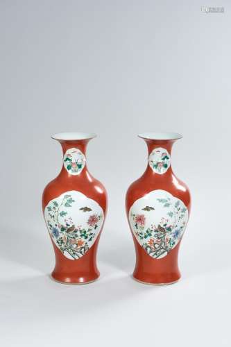 A VERY LARGE PAIR OF CORAL-GROUND PORCELAIN BALUSTER VASES