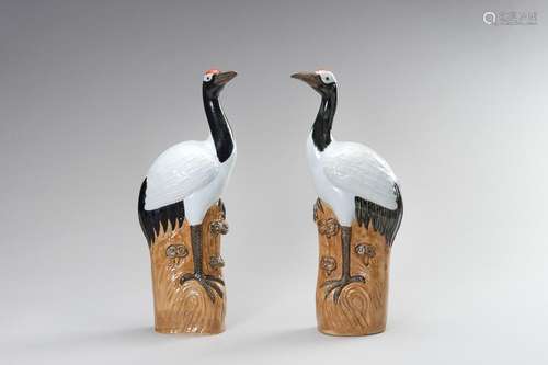 A PAIR OF PORCELAIN FIGURES OF CRANES