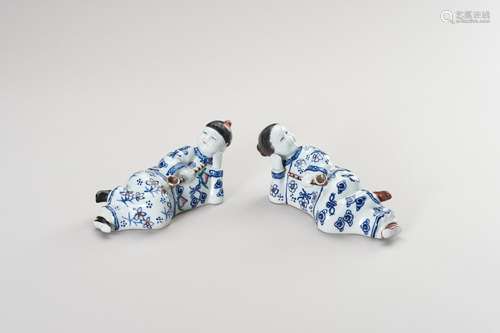 A PAIR OF ‘OPIUM SMOKER’ PORCELAIN FIGURES