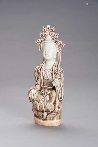 A PEACH BLOOM PORCELAIN FIGURE OF GUANYIN